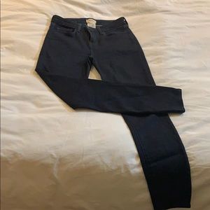 L’Agence dark wash skinny jeans.